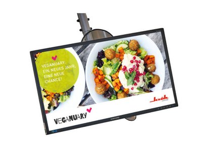 Aktionsbild zur "Veganuary" mit dem beisatz " ein neues Jahr, eine neue Chance!" und einem Falafel Gericht, auf einem Bildschirm