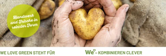Aktionsbild zu "We love green." mit dem Titel "Handwerk und frische in reinster Form", im Hintegrund sind zwei mit Erde befleckte Hände zusehen die eine Herzförmige Kartoffel umfassen