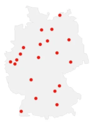 Bild von der Deutschland Karte in grau und mit roten punkten an jeweiligen Klüh Standorten