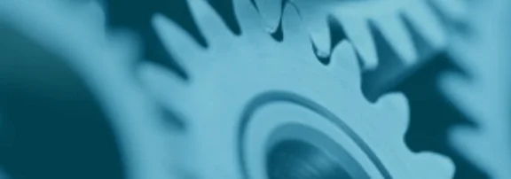 Ein Bild von ineinander greifenden Zahnrädern