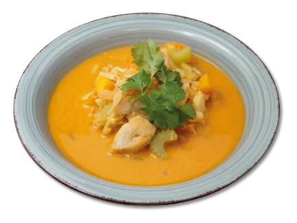 Ein Bild vob einem Tellergericht mit Fisch und Curry