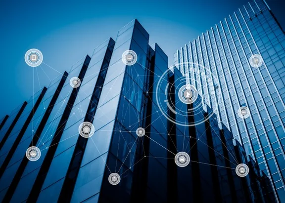 Ein Bild von einem Hochhaus, auf dem Bild sind noch verschiedene Icons miteinander verbunden